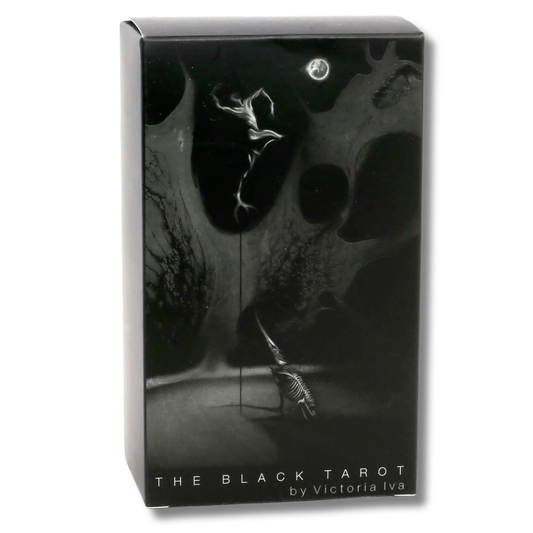 The front of a box for tarot cards in black and white. The imagery is spectral and haunting.