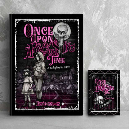 The front of a book titled 'Once Upon A F&%$ing Time' with whimsical text and illustrations on a dark background. Next to it is a similarly styled deck of cards. They both are leaning against a grey wall.