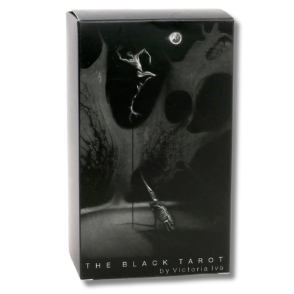 The front of a box for tarot cards in black and white. The imagery is spectral and haunting.